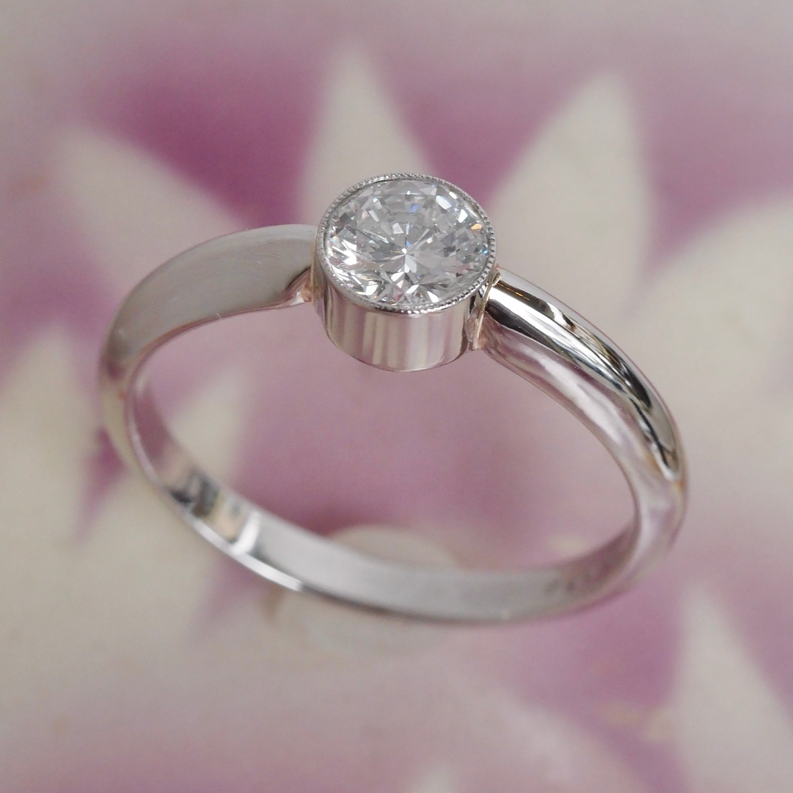 Half Carat Round Brilliant Cut Diamond Solitaire Platinum Bezel Set Engagement Ring