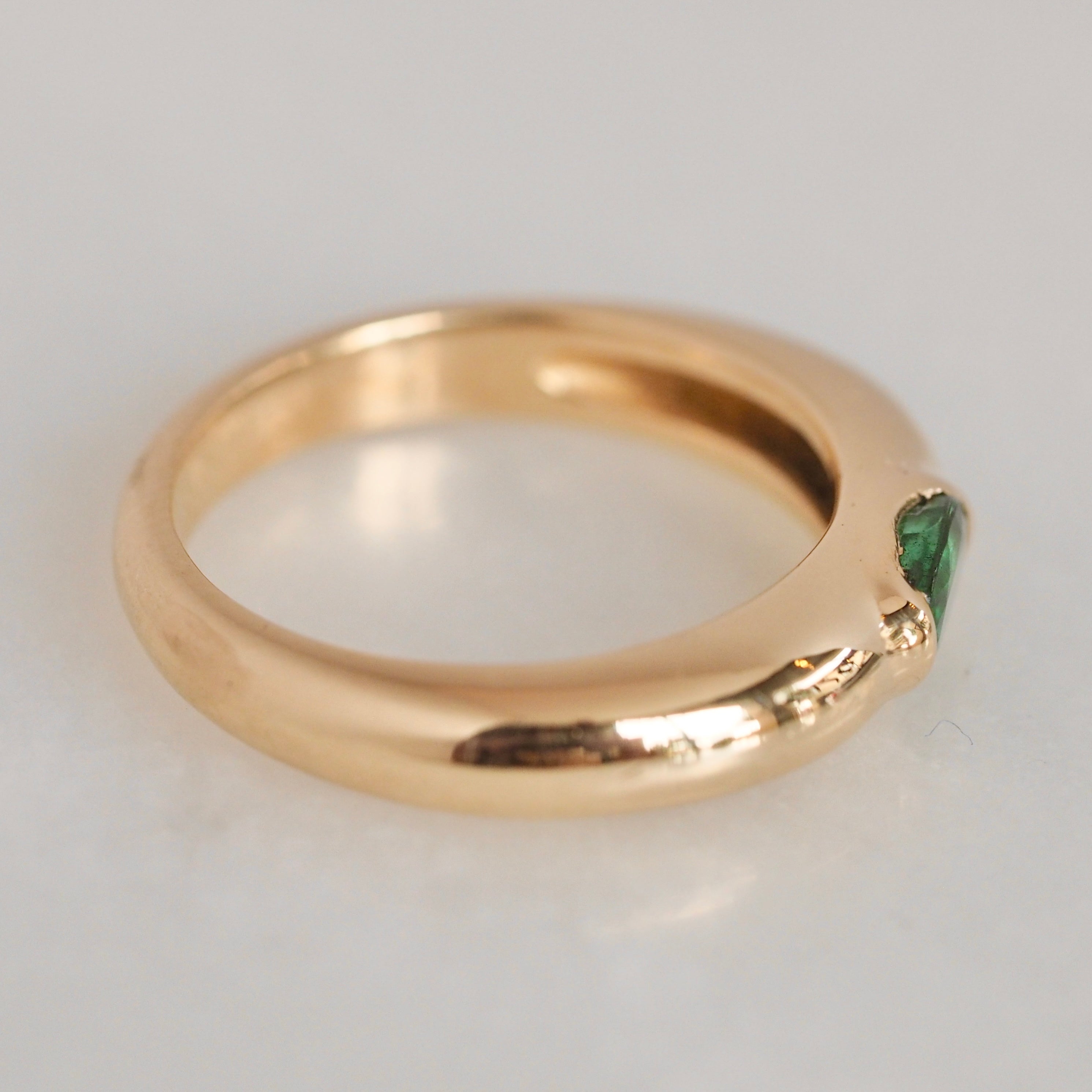 Modernist 14k Gold Emerald Half Bezel Ring