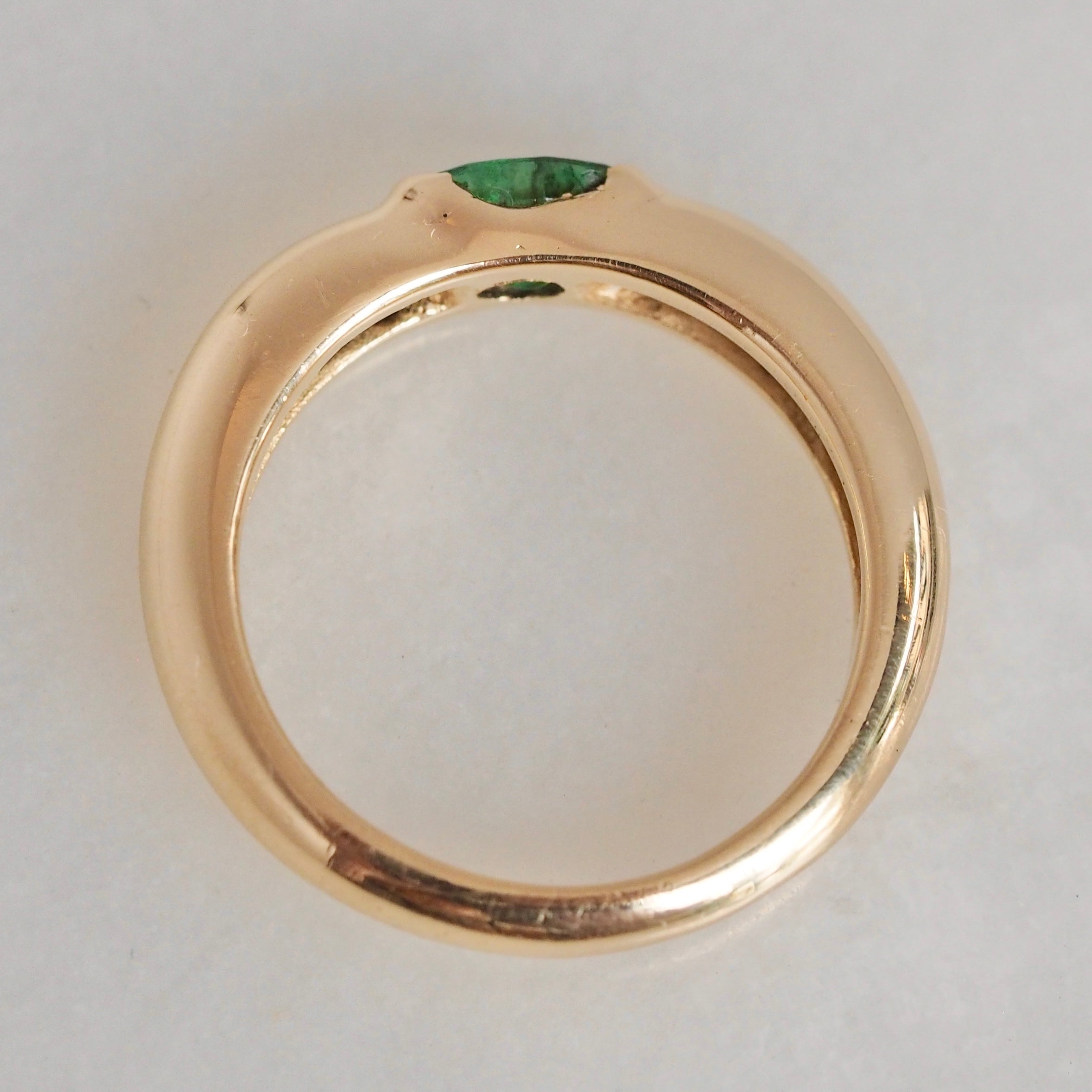 Modernist 14k Gold Emerald Half Bezel Ring