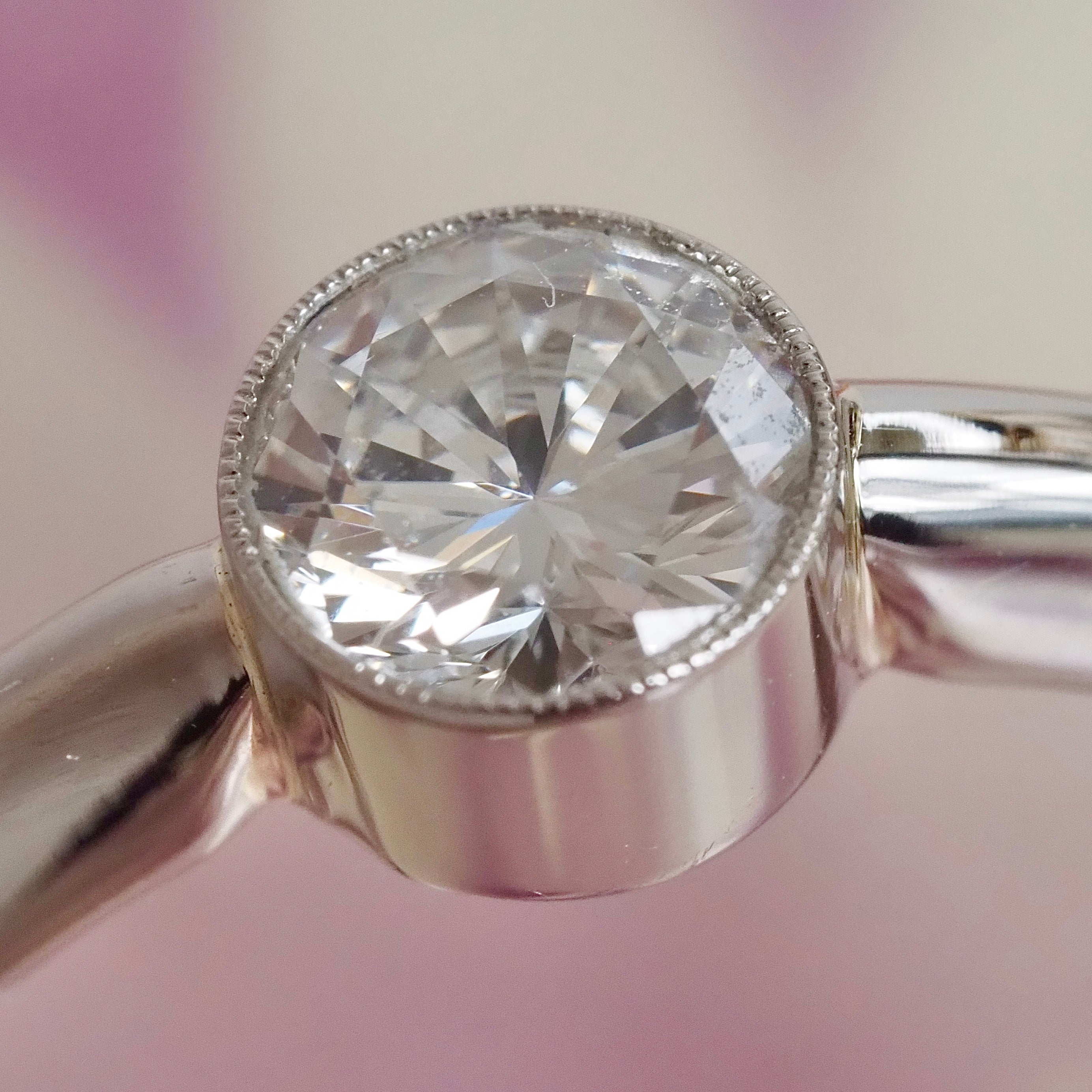 Half Carat Round Brilliant Cut Diamond Solitaire Platinum Bezel Set Engagement Ring
