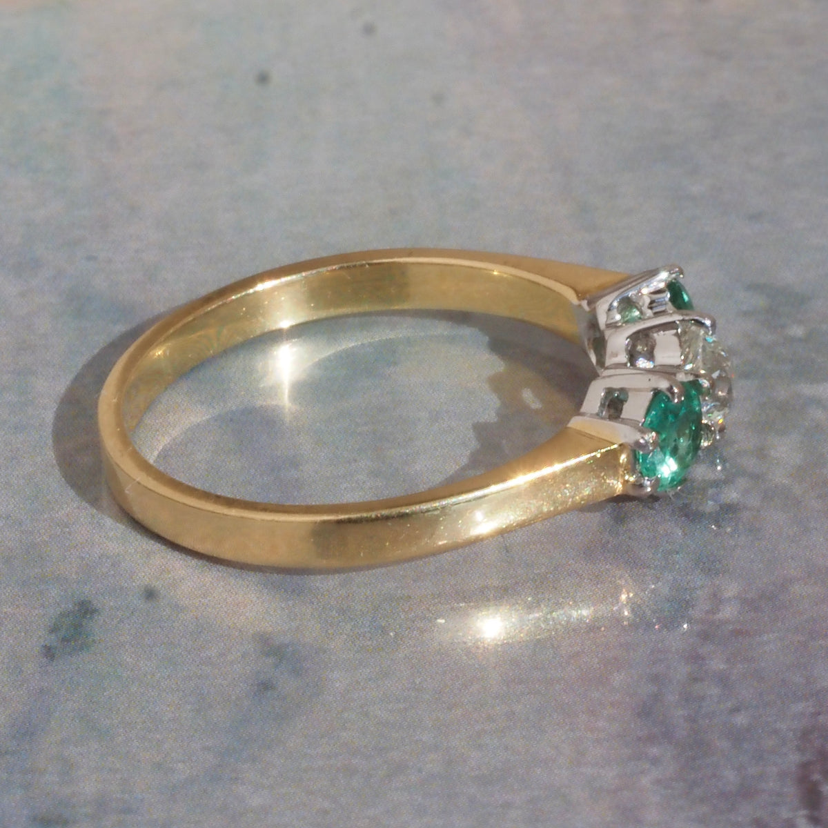 Vintage English Natural Emerald and Old European Cut Diamond Trilogy 18k Gold Ring