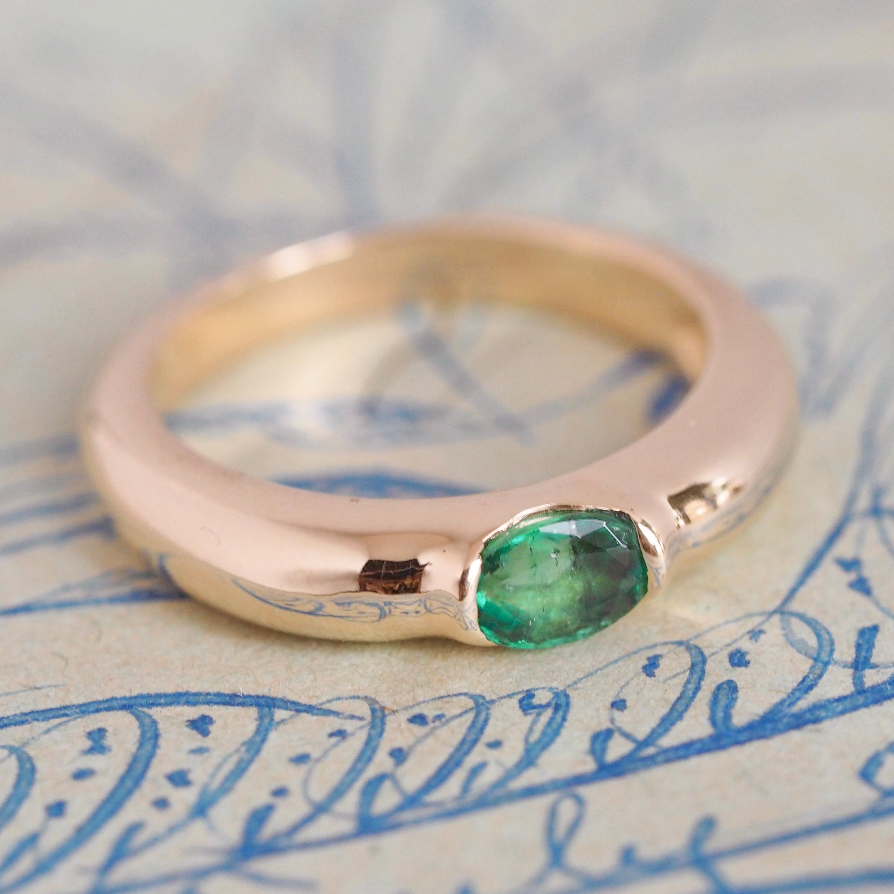 Modernist 14k Gold Emerald Half Bezel Ring