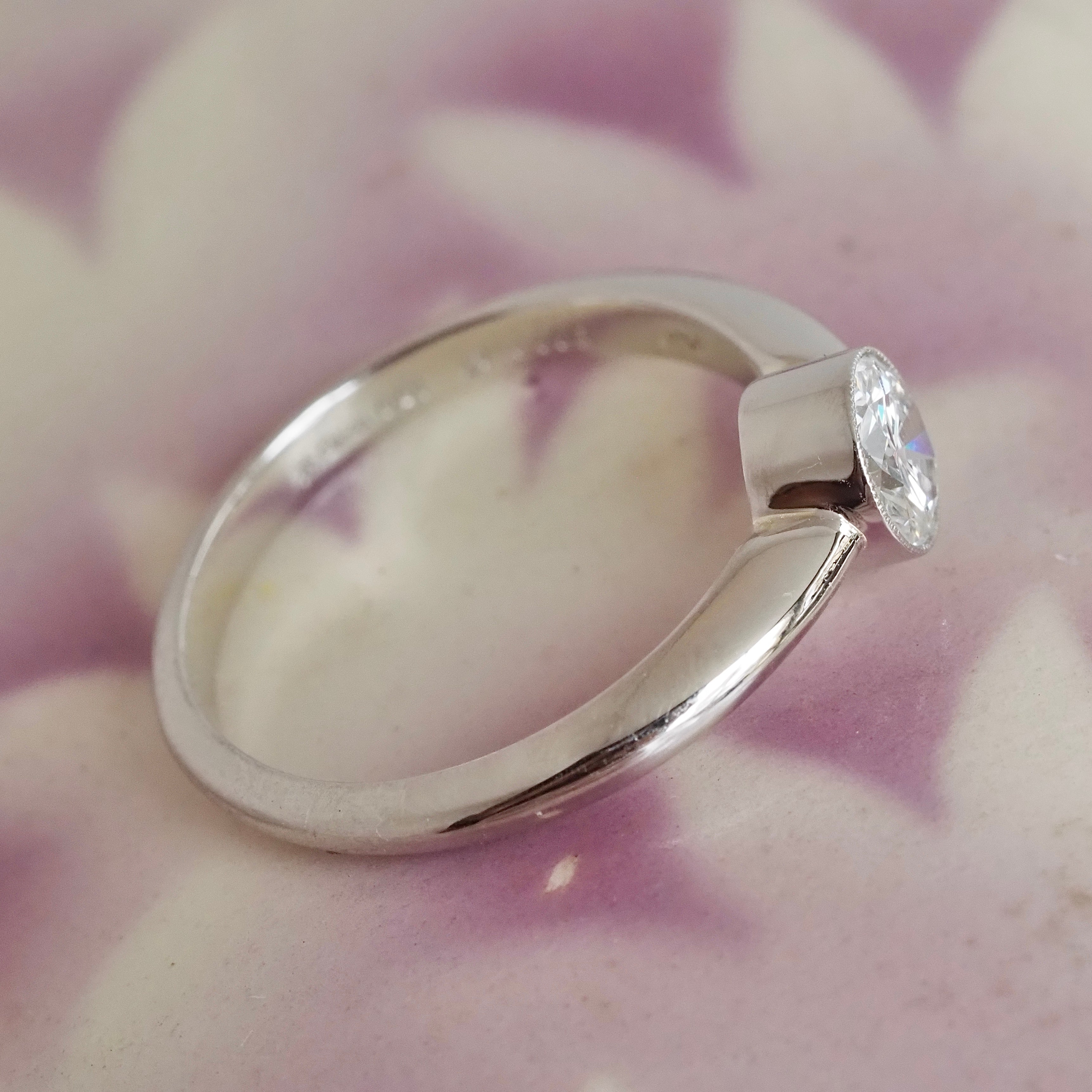 Half Carat Round Brilliant Cut Diamond Solitaire Platinum Bezel Set Engagement Ring