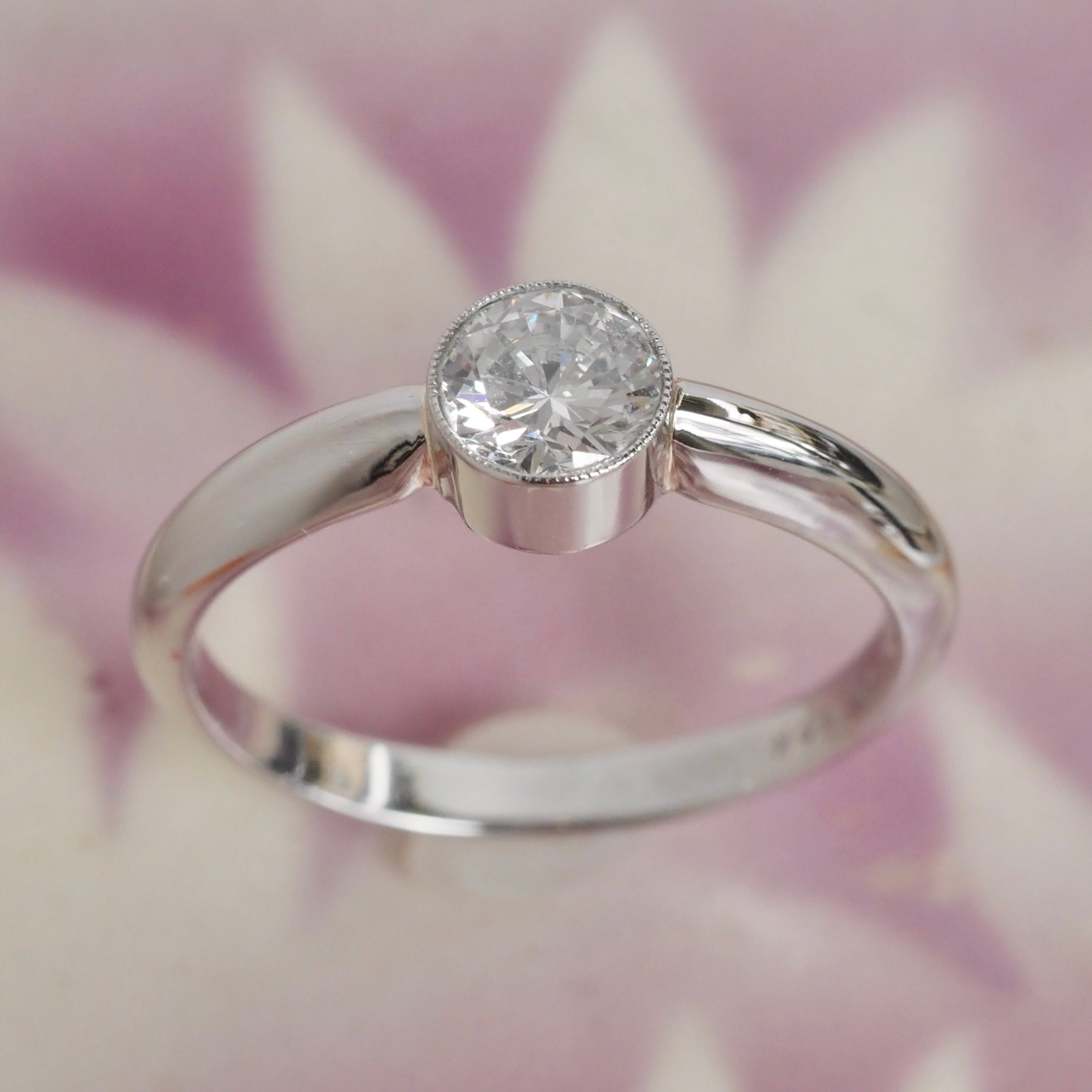 Half Carat Round Brilliant Cut Diamond Solitaire Platinum Bezel Set Engagement Ring