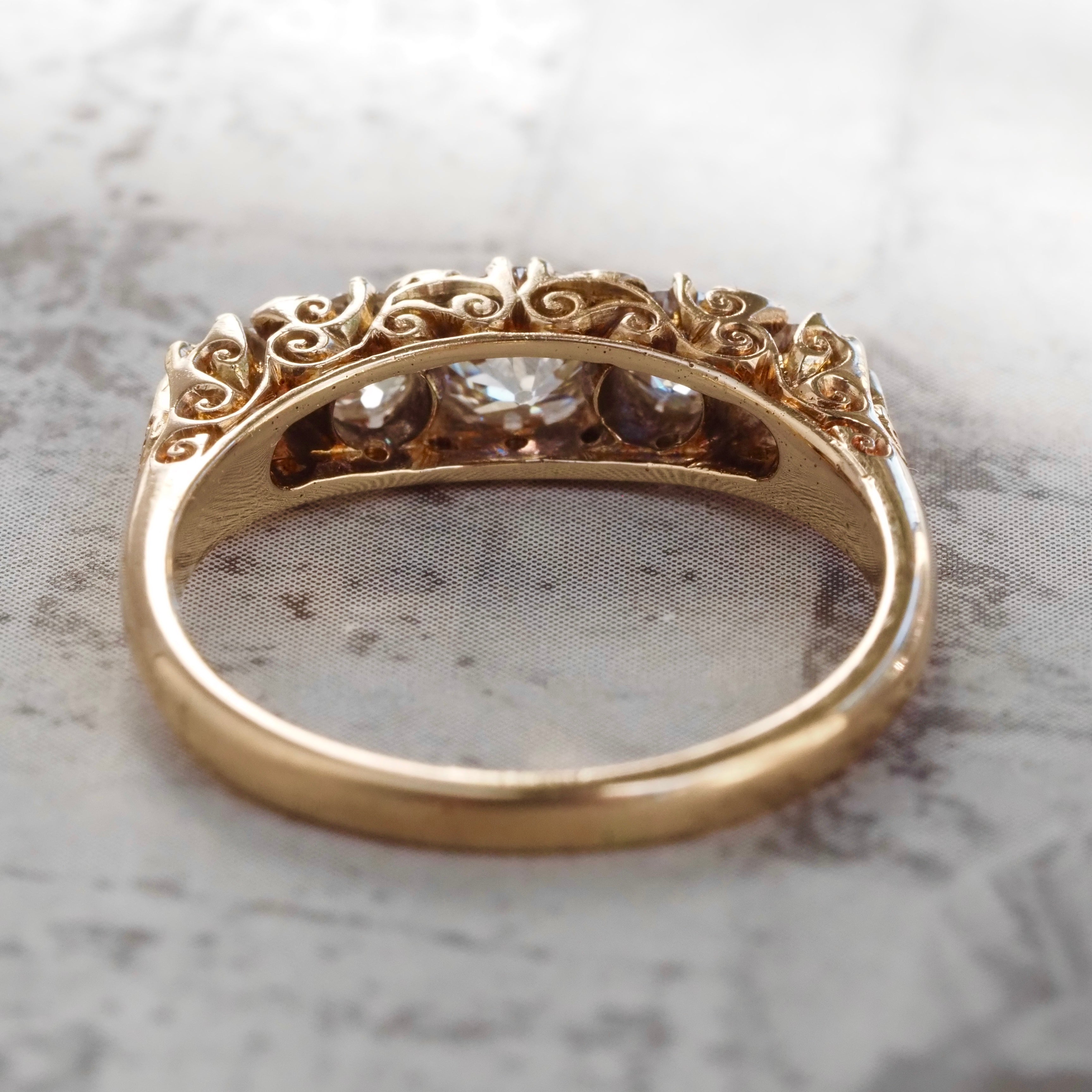 Antique Turn of the Century Old Mine Cut Diamond Five Stone 18k Gold Ring with Rose Cut Diamond Accents
