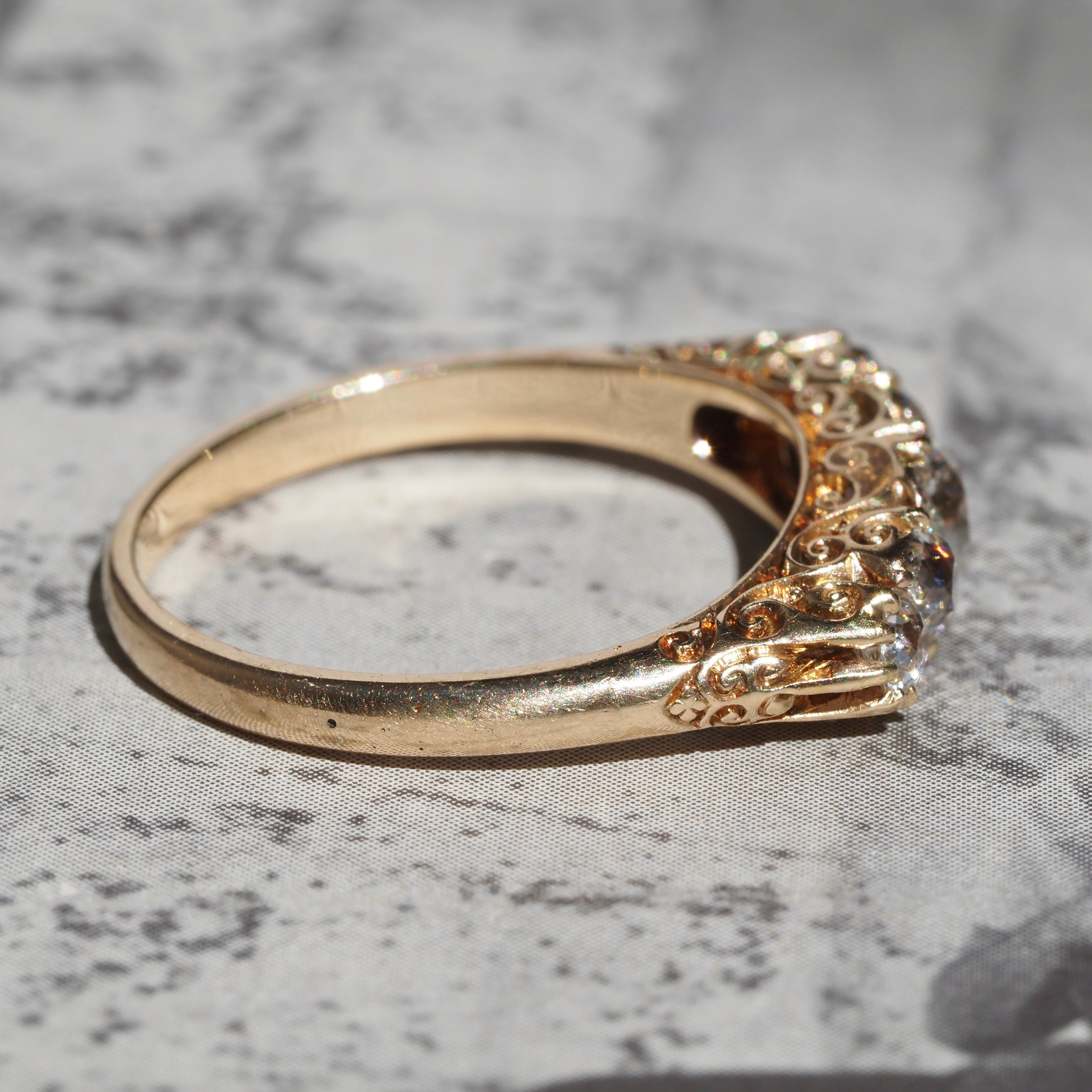 Antique Turn of the Century Old Mine Cut Diamond Five Stone 18k Gold Ring with Rose Cut Diamond Accents