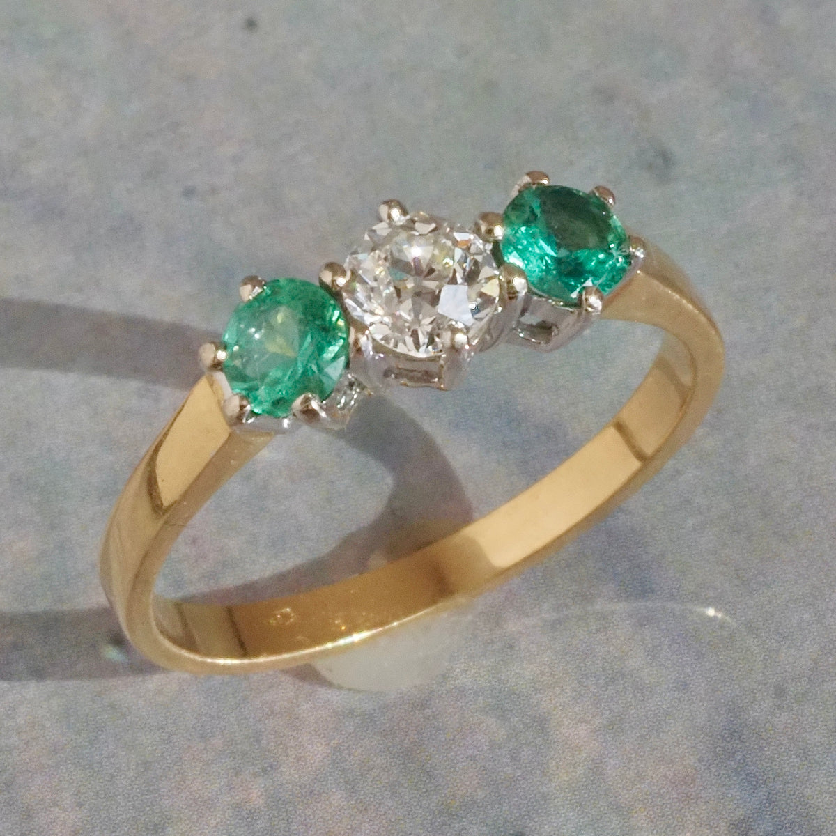 Vintage English Natural Emerald and Old European Cut Diamond Trilogy 18k Gold Ring
