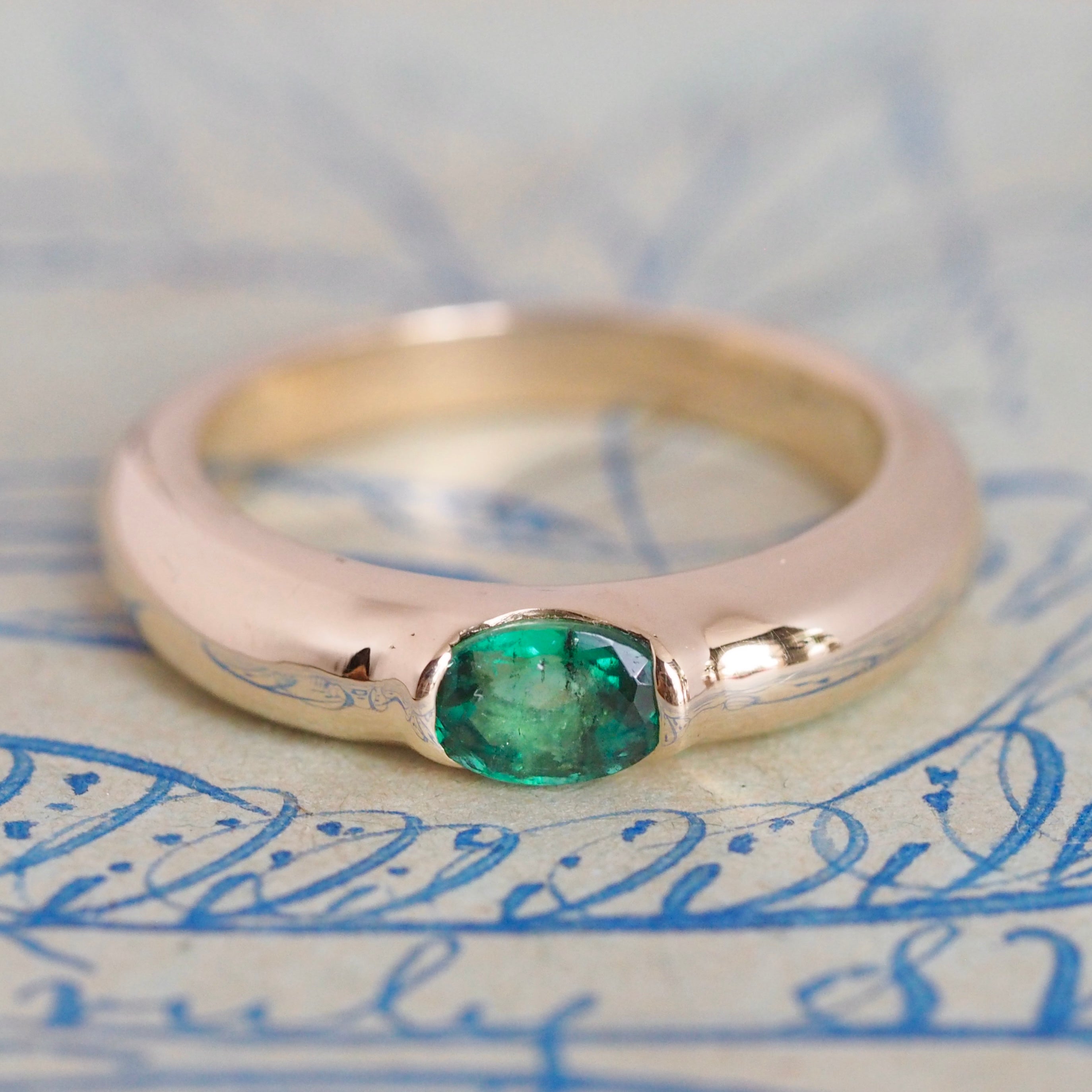Modernist 14k Gold Emerald Half Bezel Ring