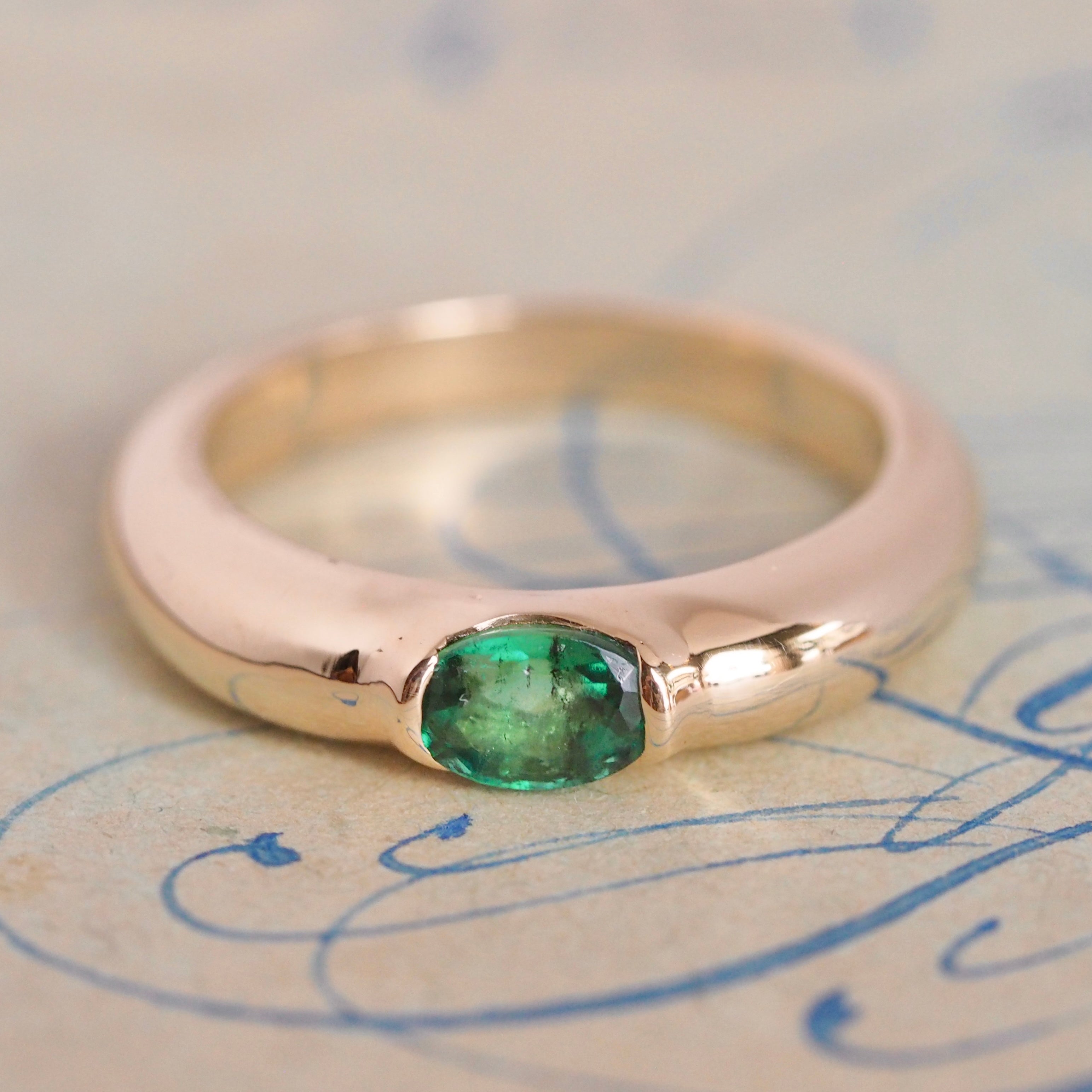 Modernist 14k Gold Emerald Half Bezel Ring