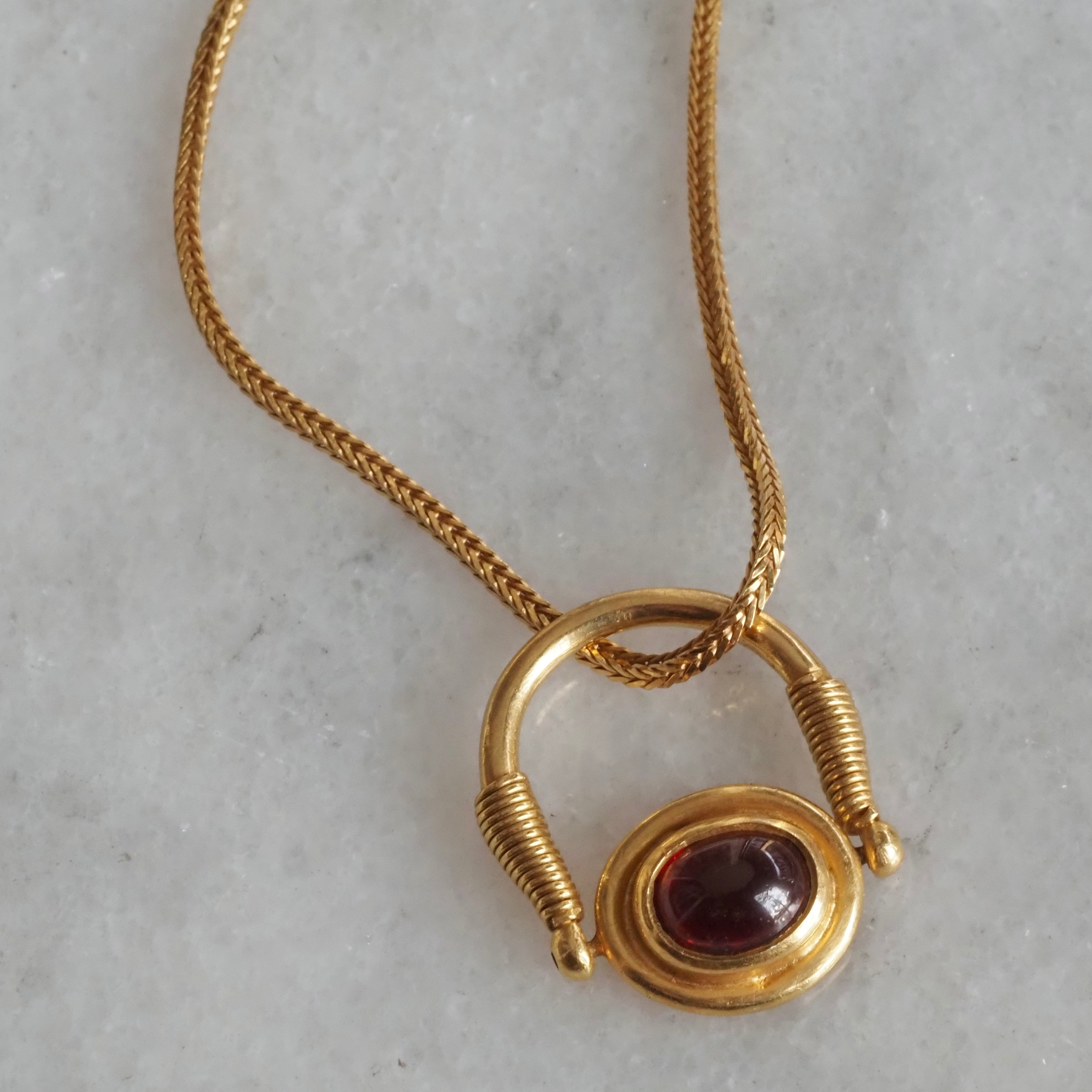 Vintage 22k Gold Ancient Egyptian Style Cabochon Garnet Swivel Ring