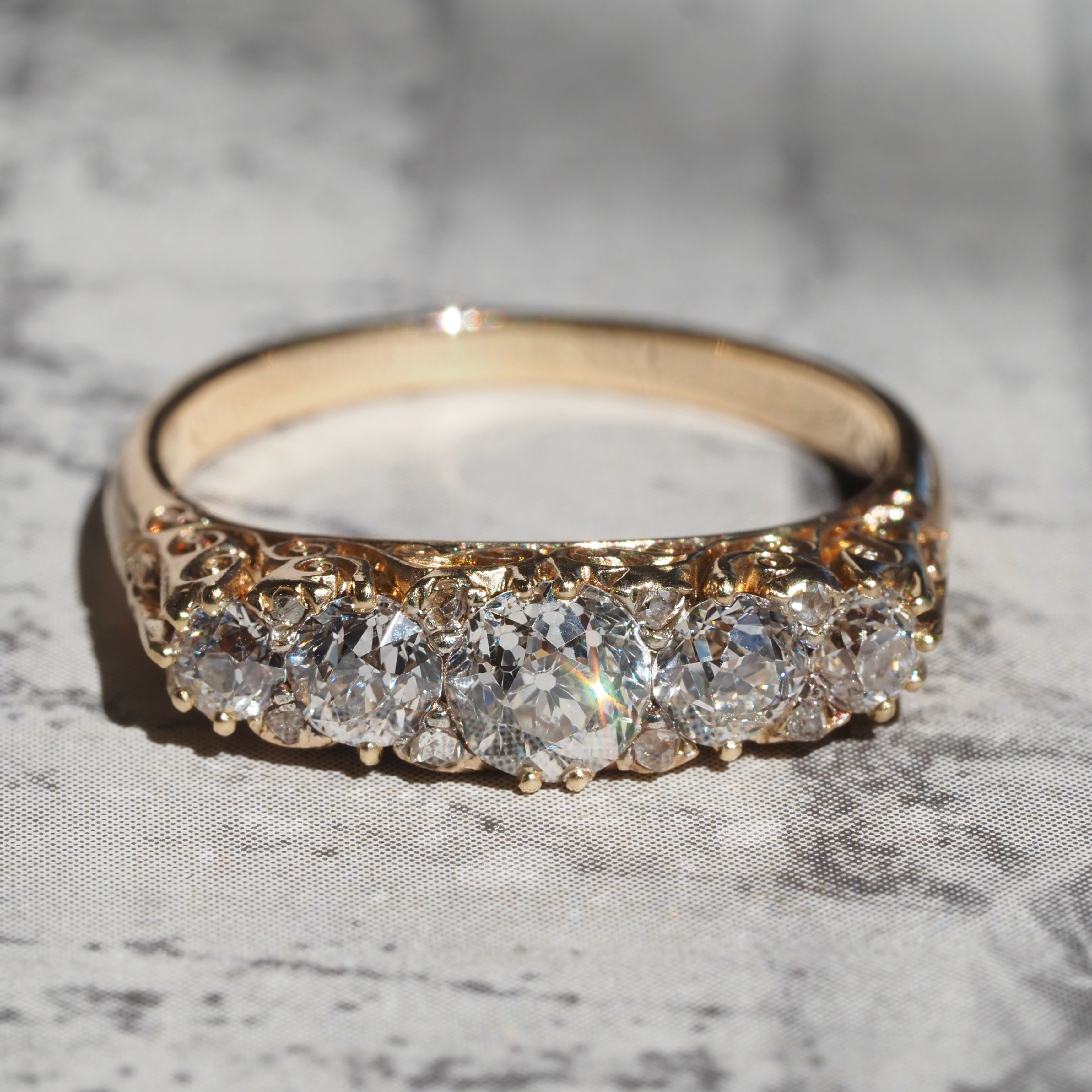 Antique Turn of the Century Old Mine Cut Diamond Five Stone 18k Gold Ring with Rose Cut Diamond Accents