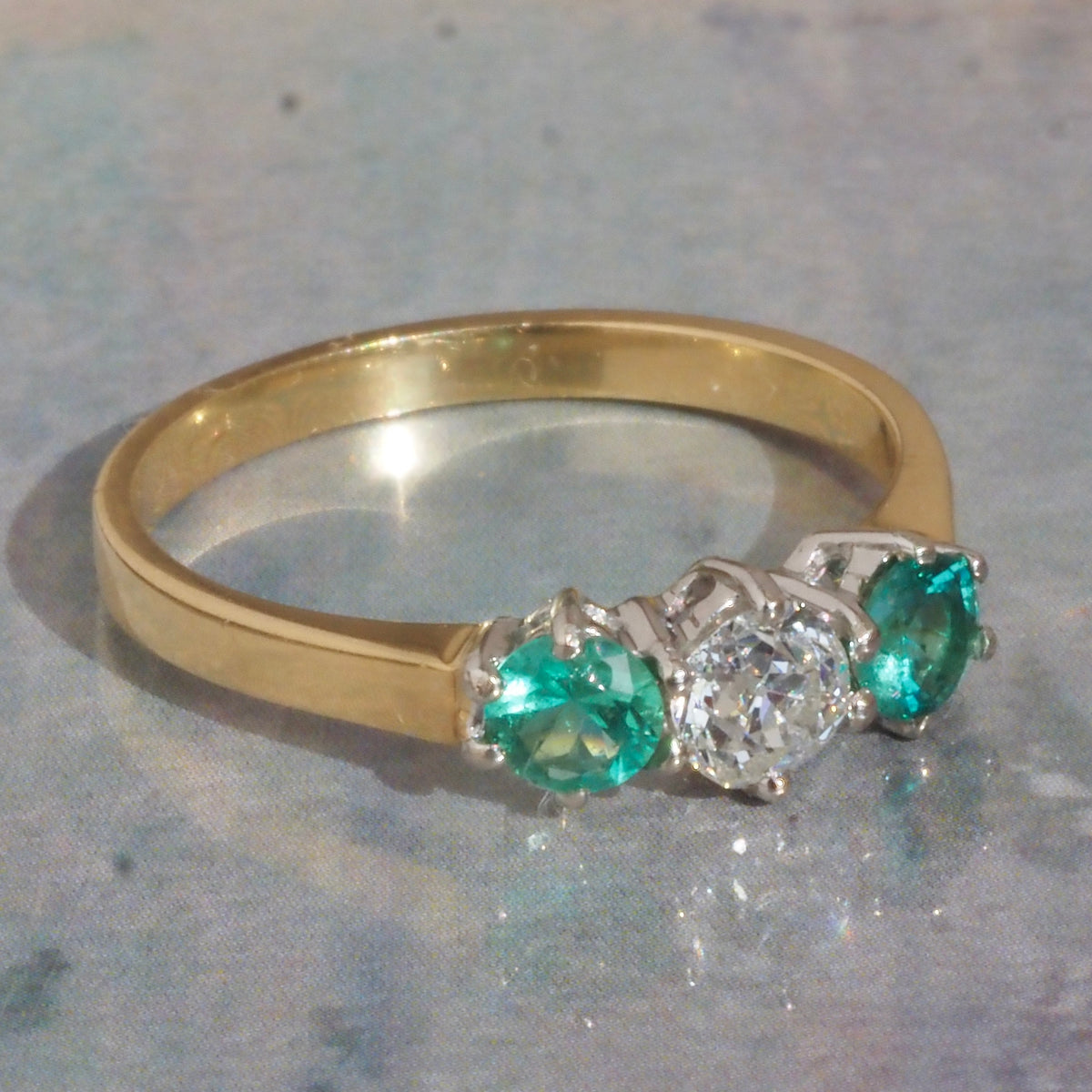 Vintage English Natural Emerald and Old European Cut Diamond Trilogy 18k Gold Ring